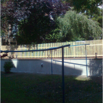 Feiks & Ingenieure KG - Stützmauer neu hergestellt und Zaun neu errichtet. Hof mit Bewegungsmeldern ausgestattet, Laternen und Steckdosen montiert